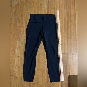 Lululemon Train times 25” leggings. Spots of discoloration photos listed.